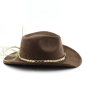 Close-up of suede cowboy hat featuring handcrafted beaded band and long leather tassels