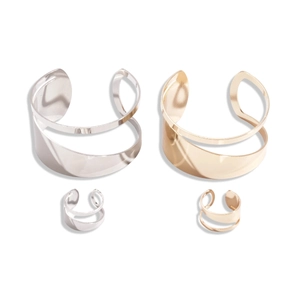 Polished minimalist metallic open bangle and ring jewelry set in gold and silver finish