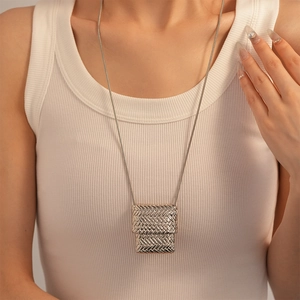 Minimalist silver long snake chain necklace with a woven texture rectangular pendant