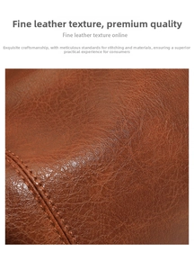 Macro shot of brown pebble grain leather texture with premium double stitching details