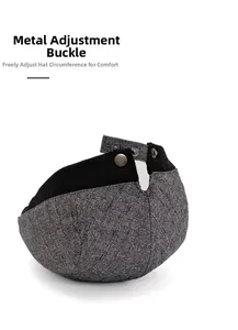 Detail of adjustable metal buckle on grey striped newsboy cap for custom size fit