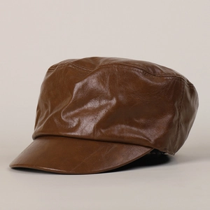 Detailed view of caramel brown PU leather hat with smooth texture and fine stitching