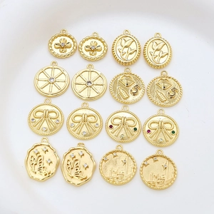 Vintage gold-plated DIY jewelry pendants with flower, rudder and bow motifs for necklaces