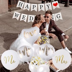 Happy Wedding banner with Mr and Mrs balloons and confetti for outdoor wedding decor