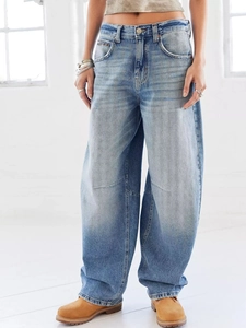Vintage washed light blue low waist baggy wide leg denim jeans for women shown on model