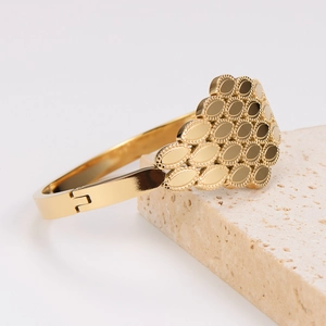 Irregular honeycomb gold stainless steel open bangle with unique scale texture design