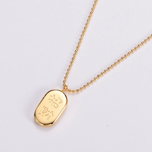 Golden titanium steel oval pendant necklace featuring Zhaocai Chinese character engraving