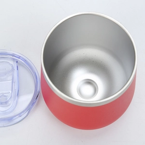 Close-up of pink 12oz stainless steel wine tumbler with transparent slider lid