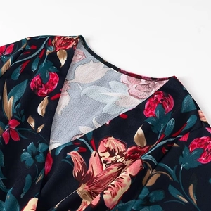 Women's V-neck long-sleeve floral dress with elegant red flower print on dark fabric