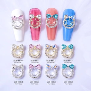 Breloques Nail Art en Alliage avec Nœud Papillon et Visage Souriant Forme de Cœur Incrusté de Strass Or Argent Accessoires de Bijoux de Manucure DIY