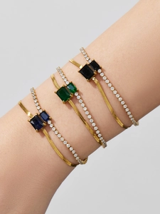 Detail of 18k gold plated double-layer chain bracelets with vibrant rectangular zirconia stones