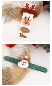 Detailed set of Christmas reindeer hair clips and plush Santa slap bracelet accessories
