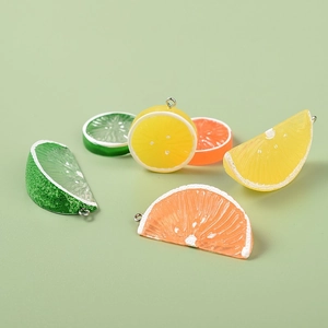 Handmade resin fruit slice pendants in lemon, lime, and orange styles for DIY jewelry