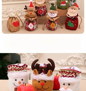 Detail of Christmas gift bags with snowman and reindeer characters in plaid fabric