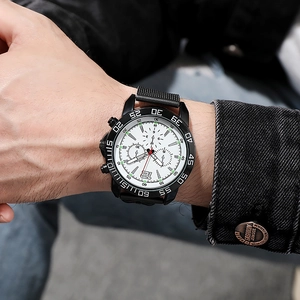 Close-up of men's business mesh watch with white dial and black steel strap on wrist