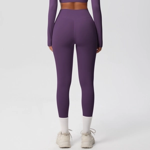 Detailed back view of high-waisted dark purple yoga pants with butt-lifting slimming fit