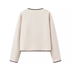 Women stylish beige tweed jacket with contrast brown trim and bow detail, back view display