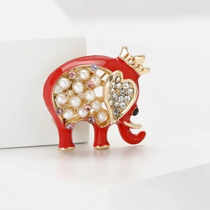 Cartoon elephant brooch in red enamel and gold finish with pearls and crystals