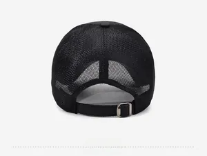 Detail view of the breathable mesh back and adjustable metal buckle on a black baseball cap