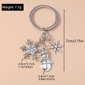 Detailed view of snowman and snowflake keychain with size dimensions in centimeters