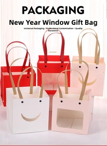 Detailed view of gift bags with smiley face windows and sturdy braided rope handles