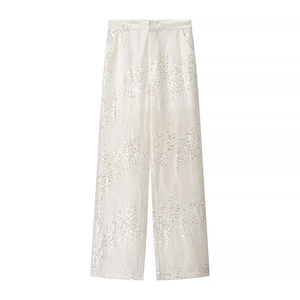 Pantaloni con paillettes a vita alta da donna color crema champagne con texture luminose
