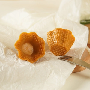 Realistic waffle-shaped caramel scented wax melts for DIY dessert decor projects