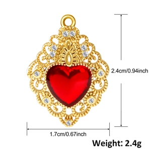 Detail view of heart ruby crown pendant with measurements 1.7x2.4cm and weight 2.4g