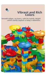 Detailed view of colorful building blocks and marble run tracks with emoji rolling balls