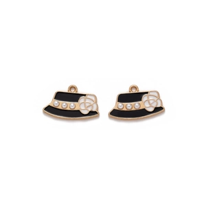 Detail of hat-shaped alloy charms with black enamel, white camellia and pearl accents