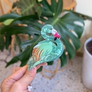 Chic acrylic flamingo hair claw with pearlescent blue and orange marble finish