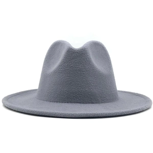 Macro detail of high-quality grey felt texture and classic pinch front on this fedora hat