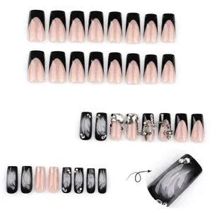 French black and pink press-on nails with 3D cross, glitter, and flame designs