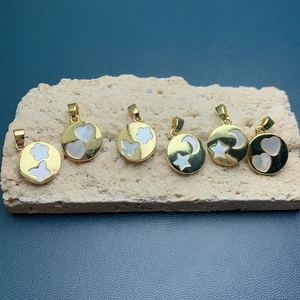 Set of 6 gold circular shell pendants with butterfly heart and star patterns