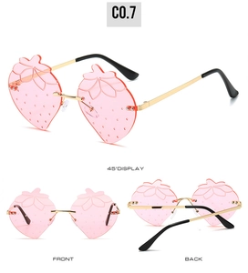 Detailansicht der randlosen Erdbeer-Sonnenbrille mit rosa Gläsern aus verschiedenen Winkeln