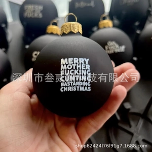 Funny black matte Christmas ornament with bold white offensive holiday greetings for trees