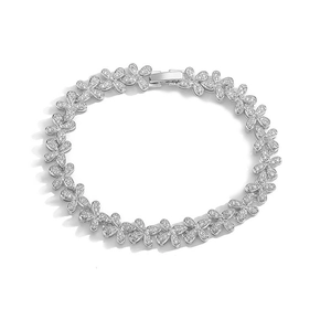 Detailed view of silver flower bracelet with sparkling pavé cubic zirconia petals