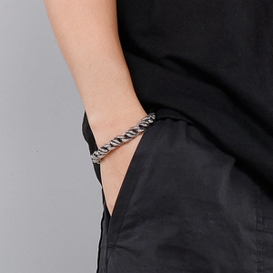 Men's bold silver twisted rope titanium steel bracelet in a stylish minimalist design