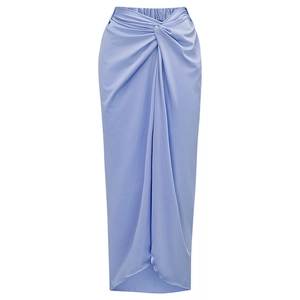 Detail of light blue satin midi skirt featuring elegant waist knot and draped wrap design