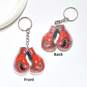 Detail view showing front and back of red acrylic boxing glove keychains with silver chain