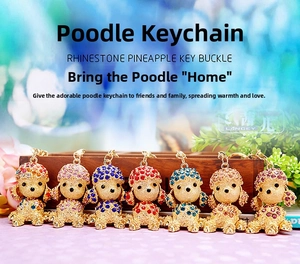 Detailed view of colorful rhinestone poodle keychains in seven different vibrant colors