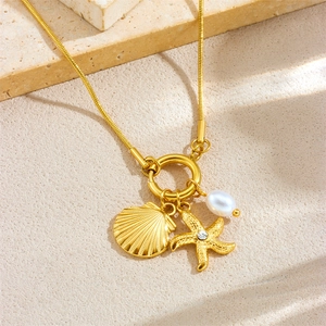 Gold stainless steel ocean necklace with pearl starfish and scallop shell pendants
