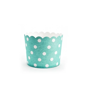 Close-up of Tiffany blue muffin paper cups with white polka dots and scalloped edges