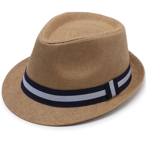 Detailed macro view of the khaki woven straw texture and navy striped decorative band