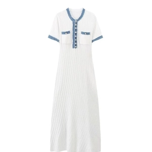 White knit maxi dress with blue denim trim, pearl buttons, and elegant midi length