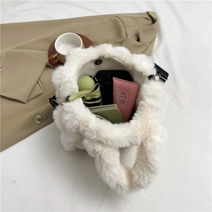 White plush tote bag with large capacity showing interior storage for daily essentials