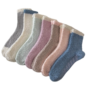 Fuzzy coral fleece slipper socks in 7 colors with non-slip grippers and fold-over cuffs