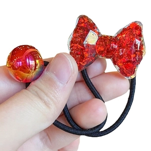 Colorful bow hair tie with red sequins and gradient bead on elastic band
