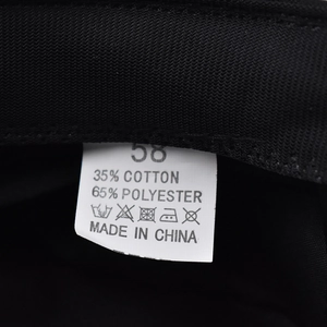 Detail of the internal care label showing size 58 and cotton polyester fabric blend