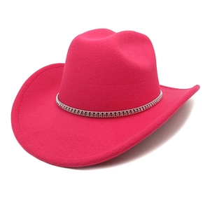 Detail of rose red wool fedora hat featuring a sparkling rhinestone band and wide brim